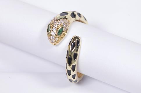 COMODIN | ANILLO ACERO DORADO ADAPTABLE SERPIENTE CON MOTAS NEGRAS
