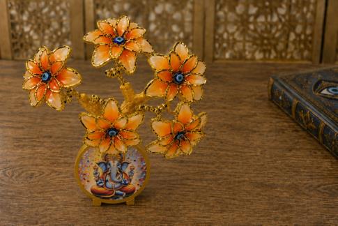 COMODIN | ARBOL OJO TURCO CON FLORES COLOR NARANJA Y BASE GANESHA EN VIVOS COLORES 20 X 17 CM.