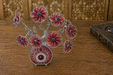 ARBOL OJO TURCO CON FLORES COLOR ROJO Y BASE OJO TURCO ACABADO MATE 20 X 17 CM.