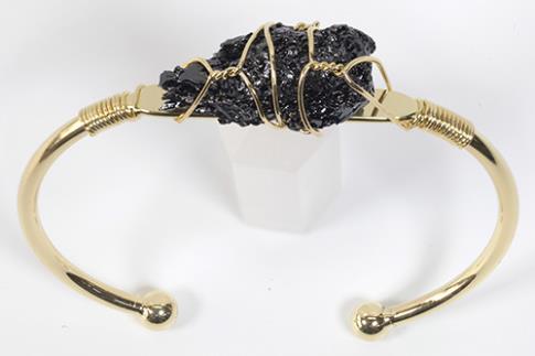 COLLARES, PULSERAS, PENDIENTES Y ANILLOS | BRAZALETE ABIERTO METAL DORADO CON CARBORUNDUM EN BRUTO
6,5X6CM
