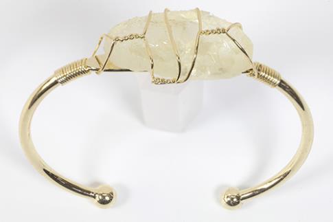 COLLARES, PULSERAS, PENDIENTES Y ANILLOS | BRAZALETE ABIERTO METAL DORADO CON CITRINO EN BRUTO
 6,5X6CM