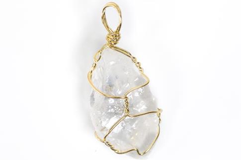 COLGANTES DE MINERALES | COLGANTE CUARZO TRANSPARENTE  EN BRUTO ENVUELTO EN ALAMBRE 2X3CM