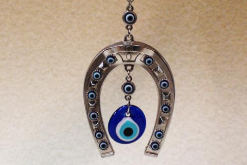 AMULETOS Y TALISMANES | COLGANTE HERRADURA 20X9CM CON OJO TURCO CRISTAL