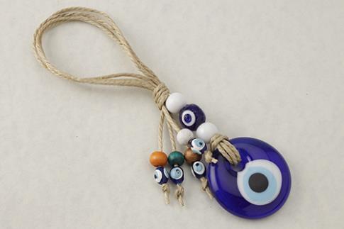AMULETOS Y TALISMANES | COLGANTE OJO TURCO CON ADORNOS VARIOS 4 CM.