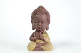 BUDAS Y GANESHAS | FIGURA BUDA NIO MEDITANDO EN TONOS MARRONES Y AMARILLOS 17 X 9 CM. (MODELOS VARIADOS)