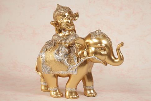 FIGURAS DIOSES, BUDAS Y MONJES | FIGURA DE RESINA DORADO. BUDA MONJE SOBRE ELEFANTE 20X9X20CM