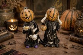 Novedades | FIGURA RESINA CALABAZA HALLOWEEN SONRIENTE CON TUNICA NEGRA  21X12CM. (MODELOS SURTIDOS)