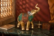 FIGURA RESINA ELEFANTE DORADO CON MANTA MULTICOLOR Y OREJAS PLATEADAS 34,5 X 31 X 11 CM. FIGURA RESINA ELEFANTE DORADO CON MANTA MULTICOLOR Y OREJAS PLATEADAS 34,5 X 31 X 11 CM.