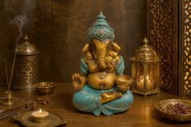 BUDAS Y GANESHAS | FIGURA RESINA PORTALUMINAS GANESHA CON TROMPA ENROSCADA TONOS AZULES Y COBRIZOS 31X19CM.