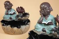 FUENTE RESINA BUNDA MONJE EN FLOR DE LOTO GRANDE 25X25CM