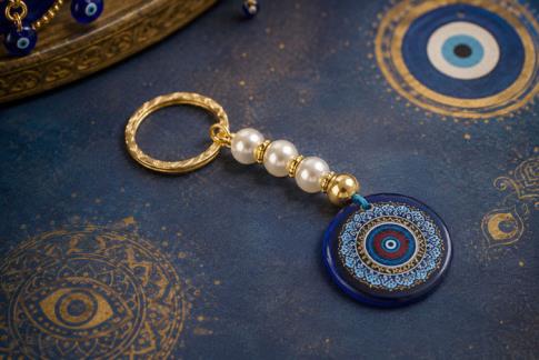 COMODIN | LLAVERO OJO TURCO COLOR AZUL Y DORADO STAMPING