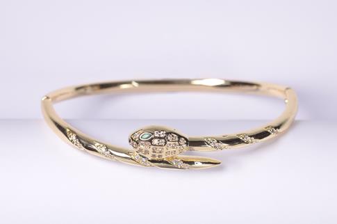 PULSERAS | PULSERA ACERO DORADO SERPIENTE ENROSCADA CON OJOS VERDES Y BRILLANTITOS
