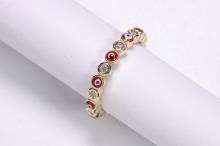 ANILLO ACERO DORADO ADAPTABLE MINI OJOS COLOR ROJO CON BRILLANTITOS ANILLO ACERO DORADO ADAPTABLE MINI OJOS COLOR ROJO CON BRILLANTITOS